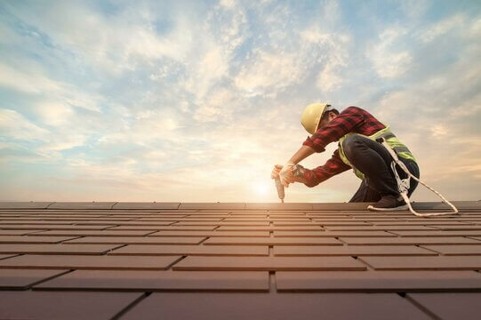 Central Coast Roofing licensed tradesperson inspecting a roof