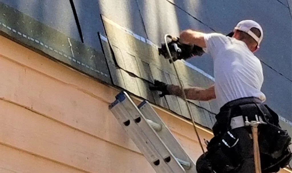 Modern roof restoration underway on a Central Coast NSW residential property