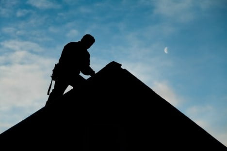 Roof restoration in progress on a Central Coast NSW residential home